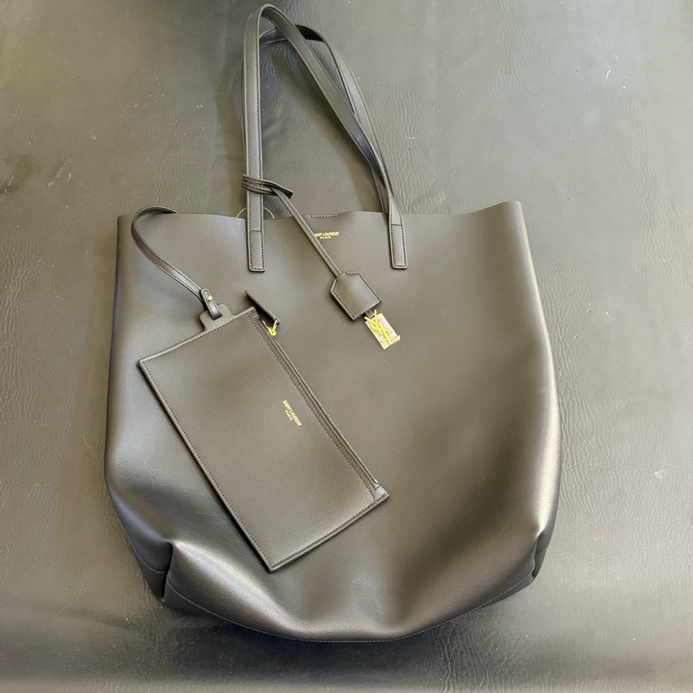 Saint Laurent Black Leather Bag with Gold Logo